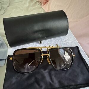 DITA. Sunglasses unisex. We Black Leather  Bag
Excellent condition